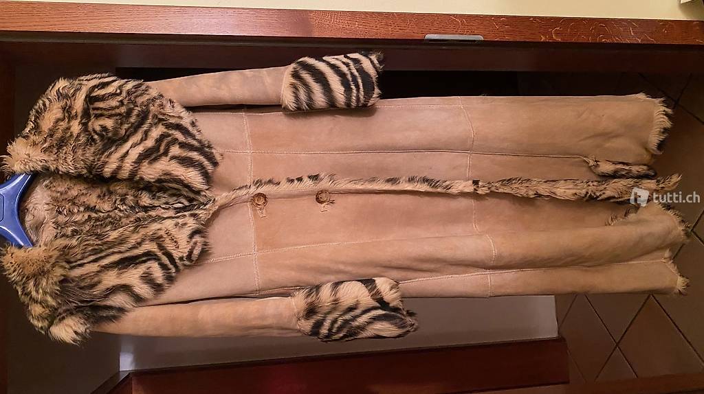 Mantello da donna di vero montone